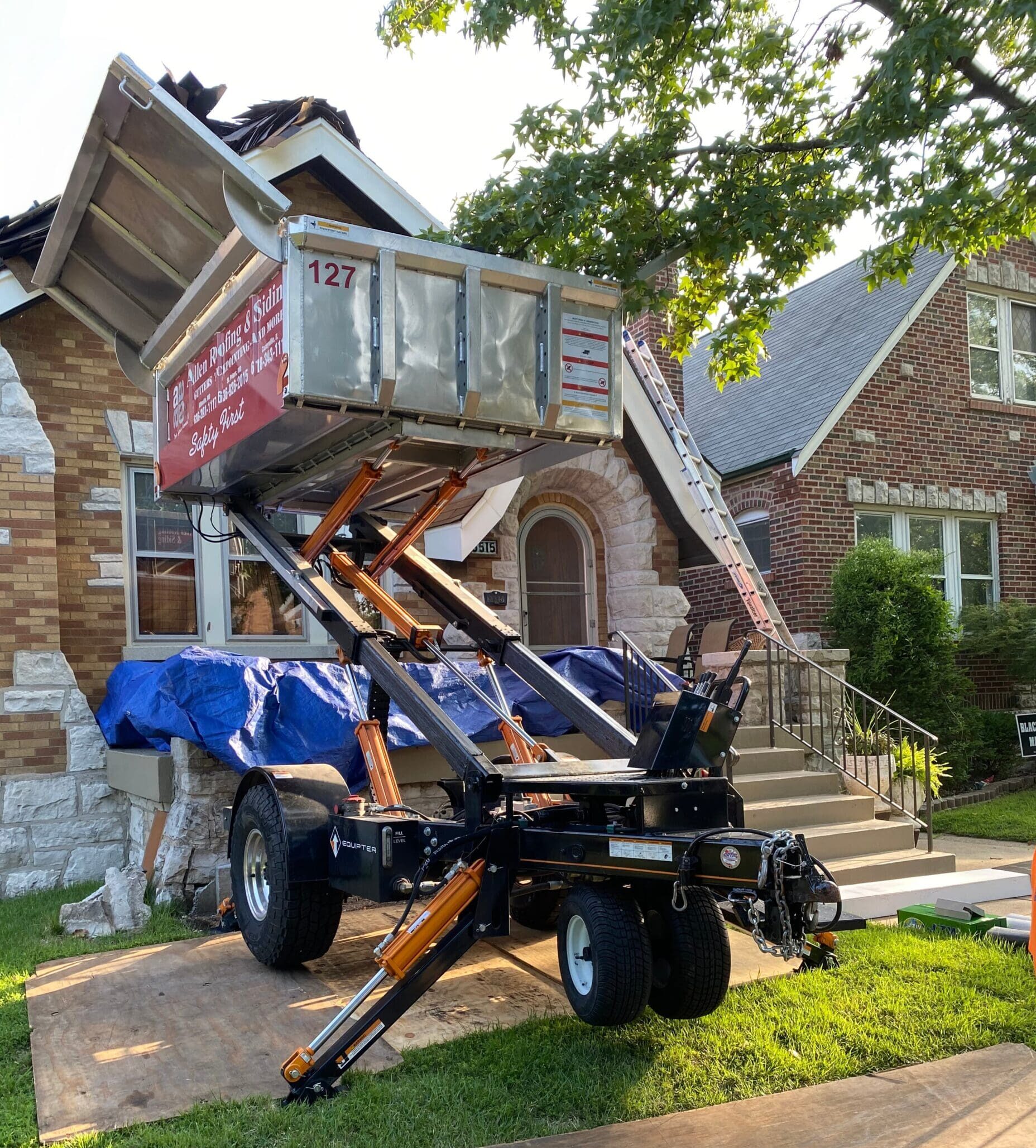 Roofing debris removal equipment